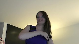 A sexy brunette with long hair has passionate sex in the bedroom.