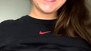 Busty curly brunette with big boobs fucks on couch