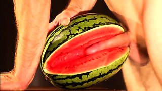 Muscular Stud Fucks and Cums on Watermelon