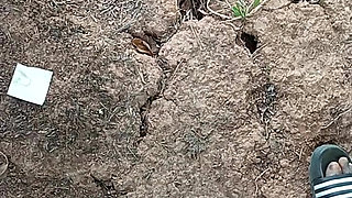 An African adult man masturbating inside the bush with his big dick