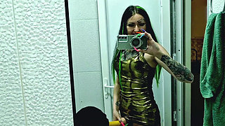 A slave is cleaning a dirty toilet when Dominatrix Nika comes to him with a strap-on and makes him take the strap-on in his mout