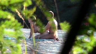 Voyeur captures amateur couple having sex on the beach