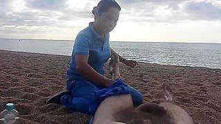 Nude massage on the beach