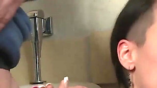 Gothic slut double penetrated in the bathroom