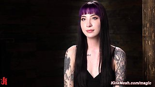 Tattooed slave suspended and flogged in dungeon