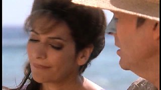 Marina Sirtis sexy on the beach showing us her great