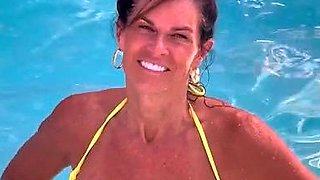 Busty curly brunette with big boobs fucks on couch