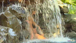 Soaking Wet Lesbian Sex on a Fake Beach and Under the Waterfalls Where These Two Orgasm