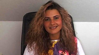Gorgeous curly haired babe masturbating in solo video
