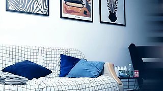 Cute amateur asian web cam girl playing with her toy