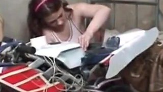 The girl with red hair fixes the bike and then fucks the mature man