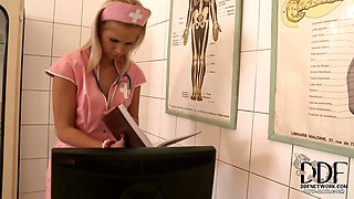 Hot Blonde Nurse In Pink Latex