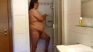 Fat woman gets really wet  hot shower show