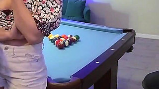 Foursome Shenanigans on a Pool Table