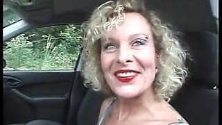 MILF with pierced pussy and nipples masturbating in the car