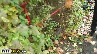 Brunette in funny panties blows cock outdoors