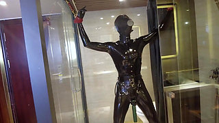 Mz20 - the Girl in Latex Clothing Locked in a Glass Room