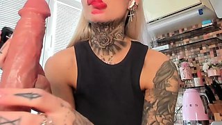 Tempting blonde with long legs and foot fetish does footjob