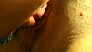 Facial cumshot for a hot blonde babe by the pool