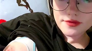 Busty curly brunette with big boobs fucks on couch