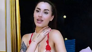 Small titted brunette Sharron with glasses masturbates