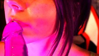 Redheaded pierced teen close up toy show