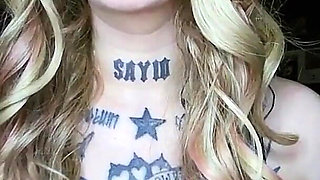 Sexy Alternative Blonde Drinking and Burping