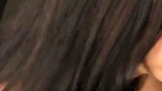 Raylene sucks huge cock from gloryhole while masturbating