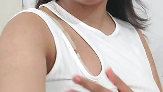 A Hot Girl Masterbating and Showing Her Big Boobs and Pussy