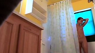Stepdaughter 21 shaves pussy in shower (voyeur)