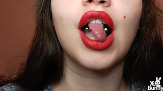 Big red lips smoking close up