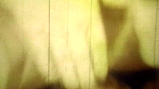 Worn Sepia Loop Captures Curly Retro Couple in Raw Bedroom Passion