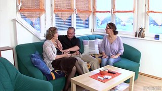 Mature granny ignites wild passion on lush green sofa