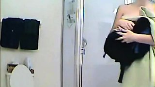 MILF stepmother spied in the shower