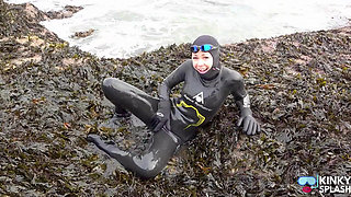 Rubbery Beach Encounter: Lucy's Neoprene Pussy Play with Stranger
