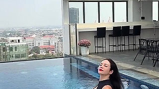 Mini Dress, Bare Legs, Roof Top Pool