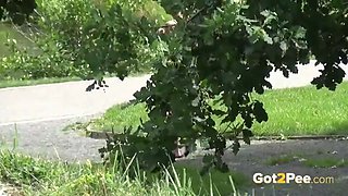 Watch This Babe Piss In Public