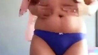 Turkish Arab in Hijab and Turban Performs a Striptease