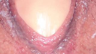 My toy brought me to orgasm. An extremely close-up shot.