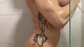 Muscular Goddess Masturbates Soapy Pussy in Shower