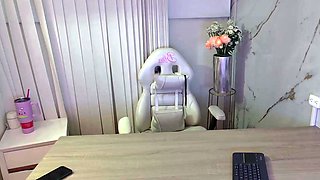 Small titted brunette Sharron with glasses masturbates