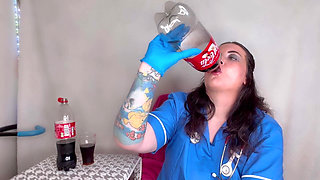 Nurse Ffw Having Fizzy Drink and Burping