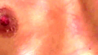 Firm titted beauty gets breast whip from mature dominant guy