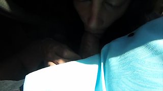 Naughty mature wife delivers a perfect blowjob in the car