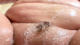 Horny while shaving pussy fingered in the shower to SQUIRT