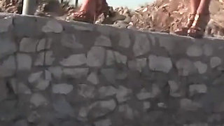 Three Girls in Bikinis on a Mountain Top Get Naked and Play with Each Other