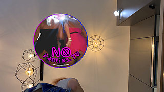 The Juggler Girl Is Here in a Long College Type Uniform Skirt to Flash Her Panties Under Her Miniskirt in the Kitchen