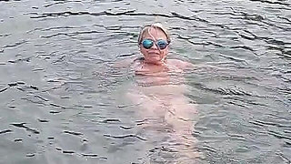 Sexy Granny Swims Naked in a Lake!