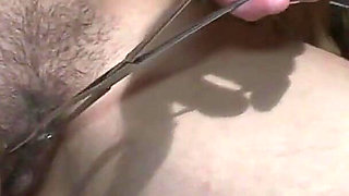 Pretty Blonde Girl Is Chained to the Ground to Be Tormented by Three Men