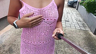 A Public Walk Around the City Without Underwear in a Transparent Dress